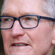 A closeup of Tim Cook's face frowning.